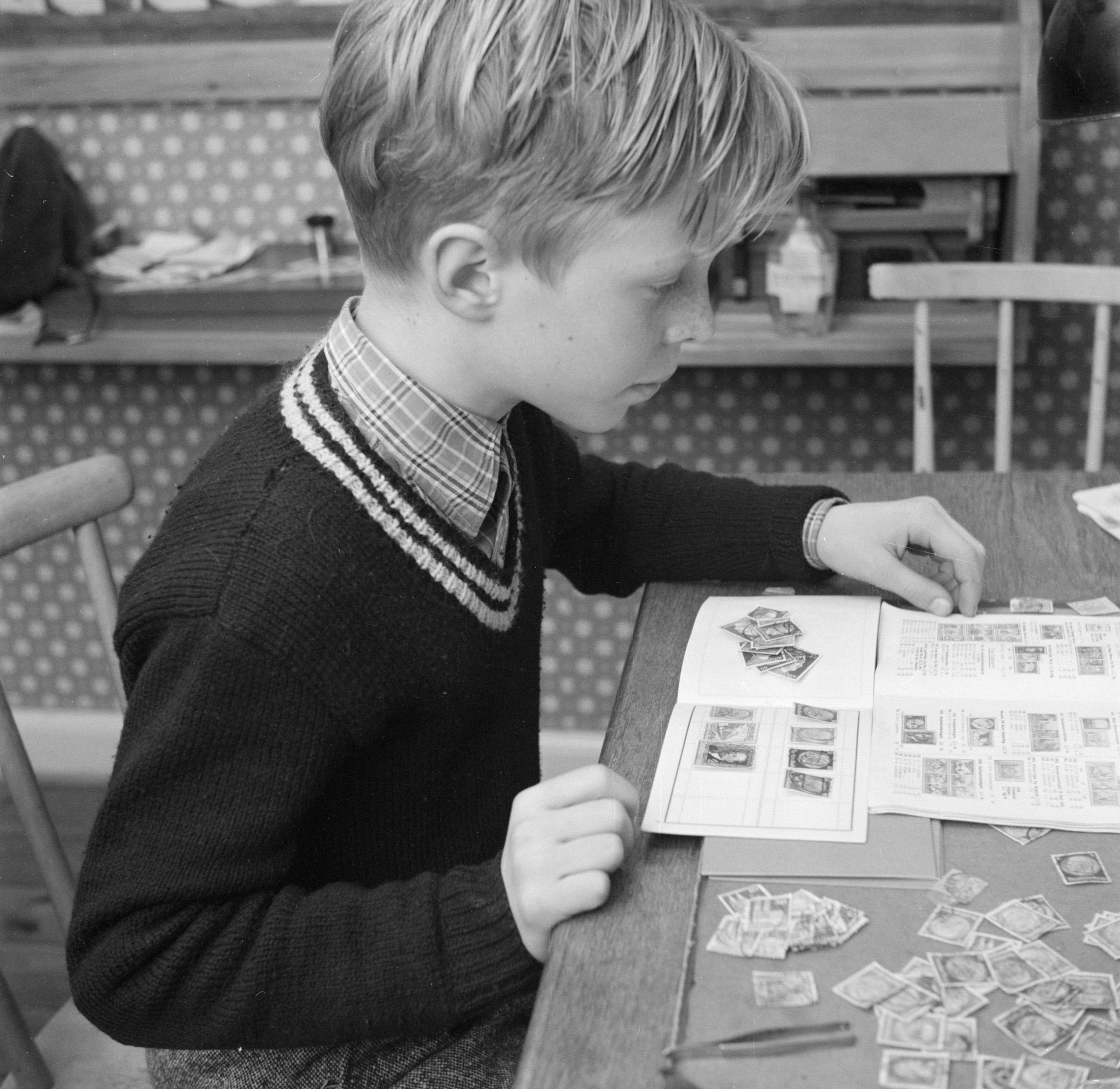 child-collecting-stamps-public-domain