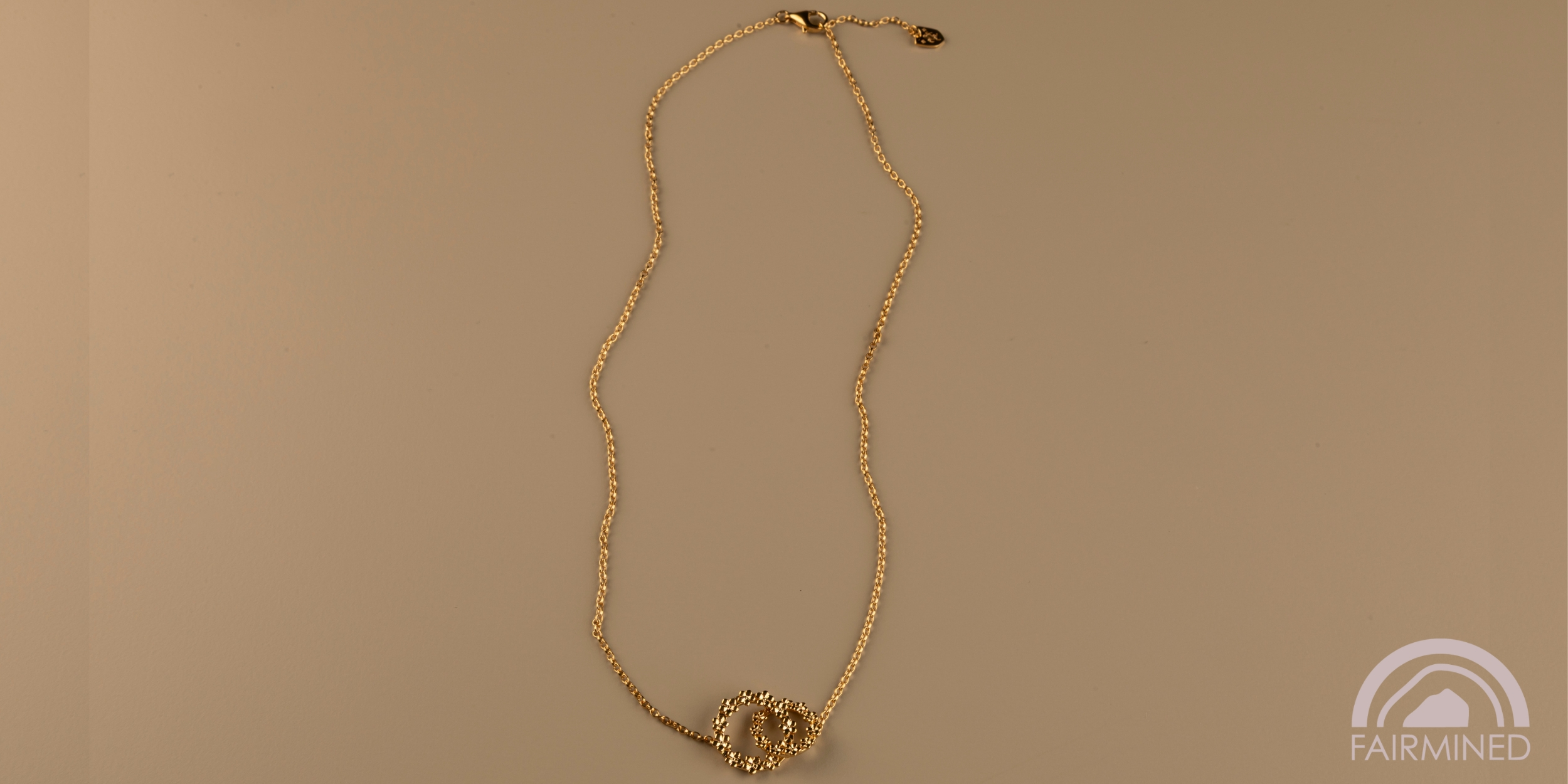 The Forget-Me-Not 'Love Link Wreath' Silver Necklace layered in Fairmined Gold